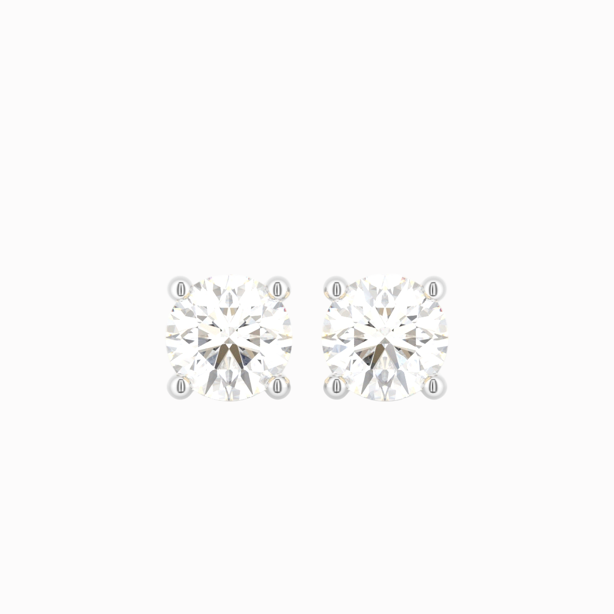 Solitaire ørestikker i 18 kt hvidguld med brillantslebne diamanter – nærbillede forfra