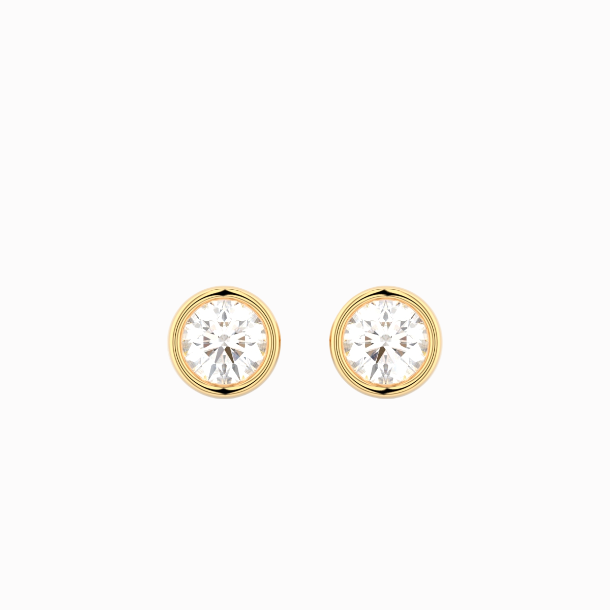 Bezel diamant ørestikker i 18 kt guld med brillantslebne diamanter – nærbillede